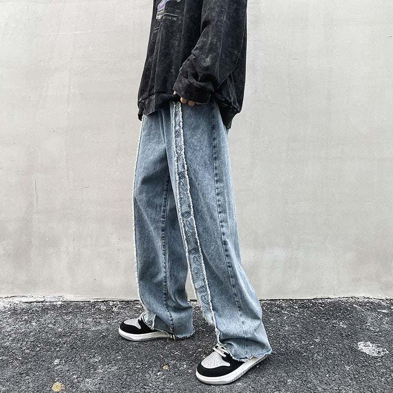 DISTRESSED RAW HEM WIDE LEG JEANS - INTOHYPEZONE